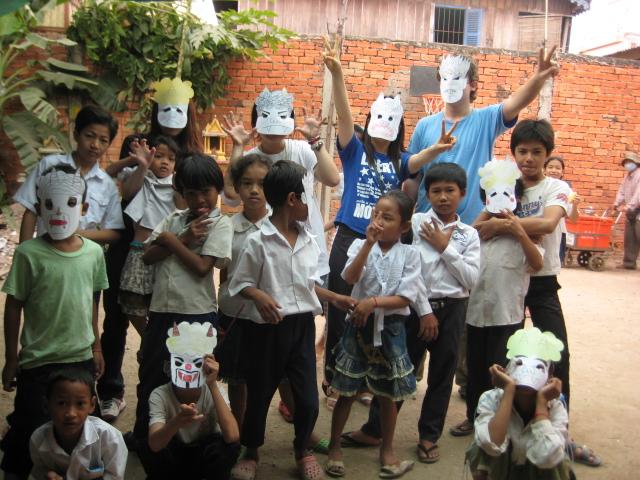 Students wear the masks they learned to make from a Projects Abroad volunteer teaching in Cambodia Students pose with their handmade masks at one of our teaching placements in Cambodia